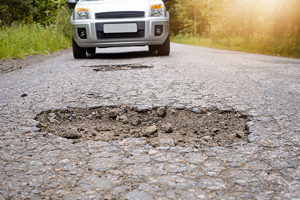 7 Pothole Problems That Don’t Show Up Until Days Later (Tires, Wheels, and Steering)